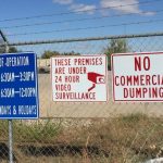 signs on a fence