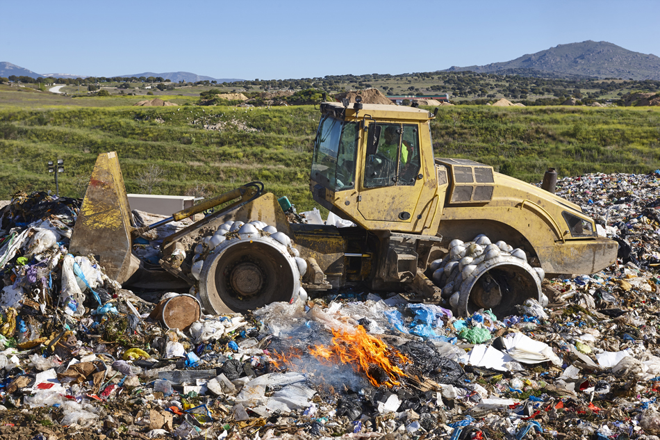 Equipment near a waste fire