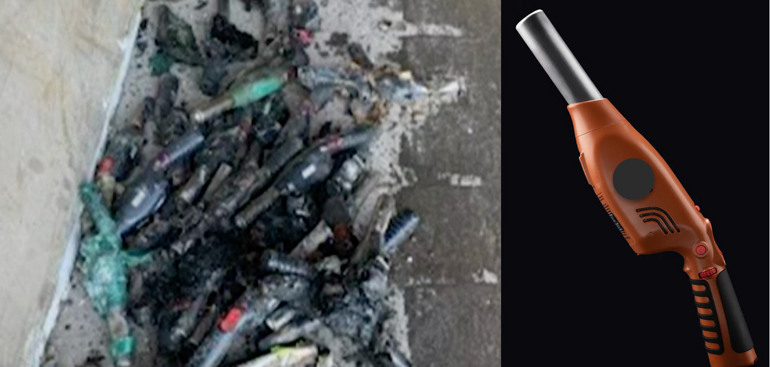 Discarded lithium-ion batteries mixed into a waste and recycling pile.