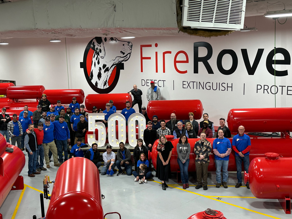 The Fire Rover team poses to celebrate their award.
